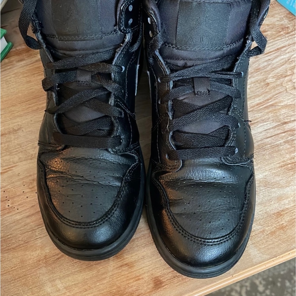 Triple black air Jordan youth 4.5
